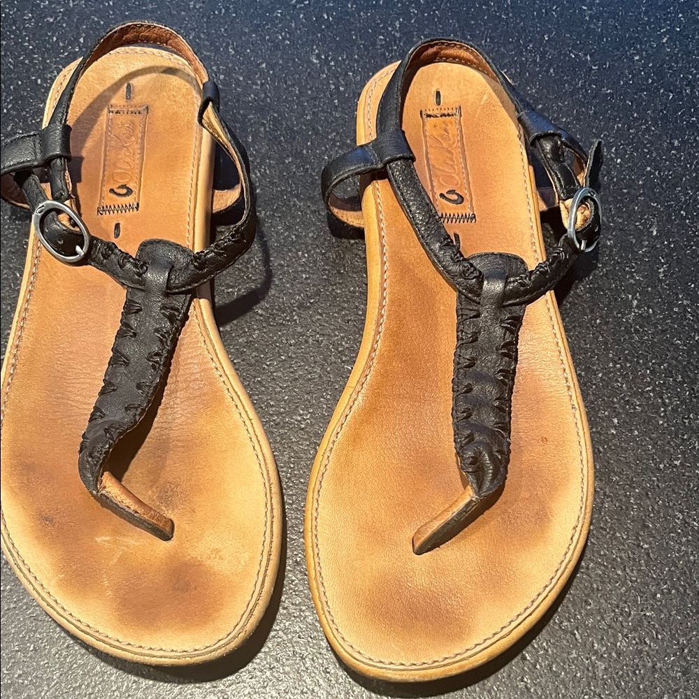 Olukai Kukuna Black with tan insoles Leather Sandals